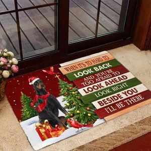 Christmas Doberman 2 Look right beside you Doormat