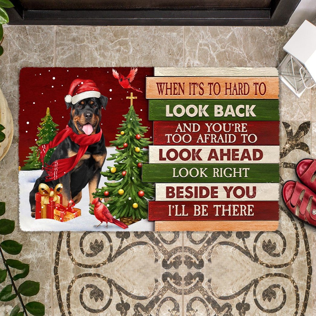 Christmas Rottweiler 1 Look right beside you Doormat